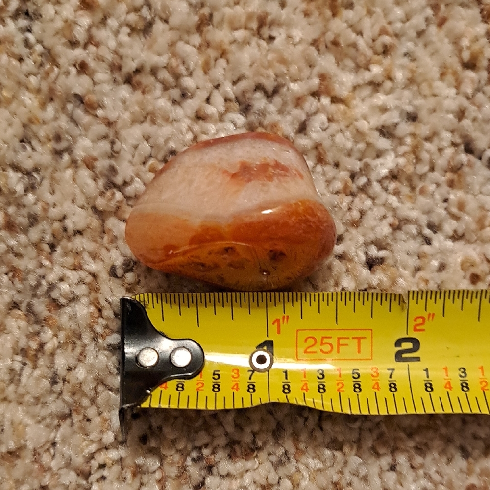 Polished Orange and White Stone